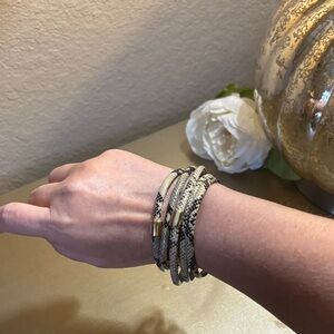 Elegant Gold and Black Snake Print Bracelet